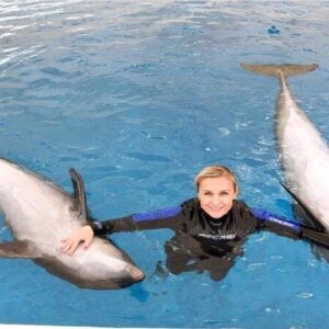 Swimming with Dolphins in Side